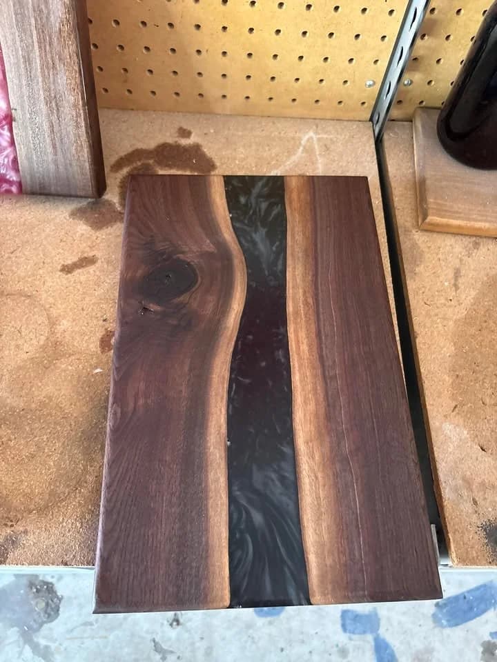 Obsidian Serving Plane, a bespoke commission in Black walnut · onyx resin river